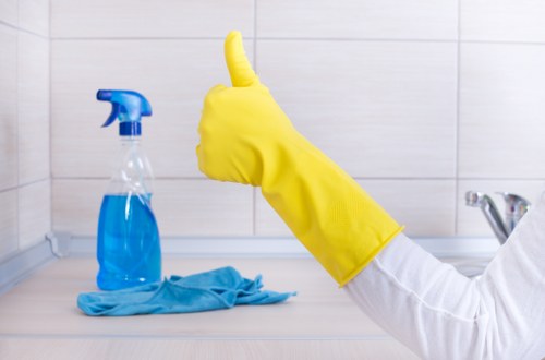 Technician treating carpet stains